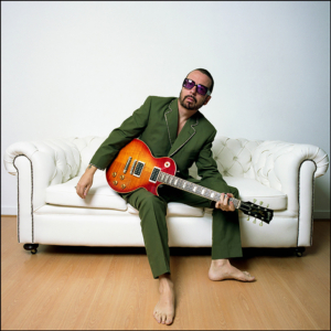 Dave Stewart, on his office sofa in London, early 90s